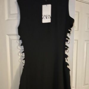 Zara midi side ring dress. Black dress. Style with leather boots and jacket.